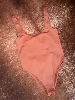 A. New. Day Mauve one piece, XS